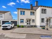 Ansicht Haus - Familienfreundliche Doppelhaushälfte mit Garage und Garten in einer ruhigen Wohnlage