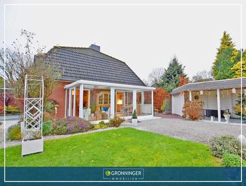 Hausansicht - Lichtdurchfluteter 4-Zi.-Doppelhaustraum mit Wintergarten, Kamin, Sauna und Gartenidylle