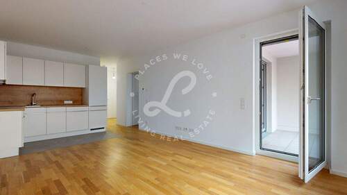 Wohnzimmer - Neubau Erstbezug: Stilvolle 2-Zimmer-Wohnung mit Einbauküche & Loggia