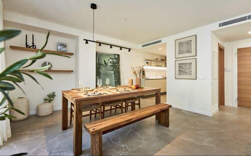 Offenes Wohngefühl durch harmonischem Küchenübergang - 