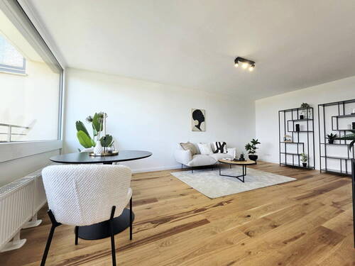 Wohnzimmer - Stilvoll sanierte Eigentumswohnung mit Sonnenbalkon im schönen Findorff