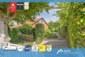 Hausansicht - Wunderschönes Einfamilienhaus zur Renovierung in idealer Lage mit großem Kaufgrundstück