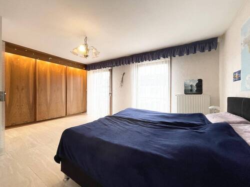 Schlafzimmer mit Balkonzugang - 