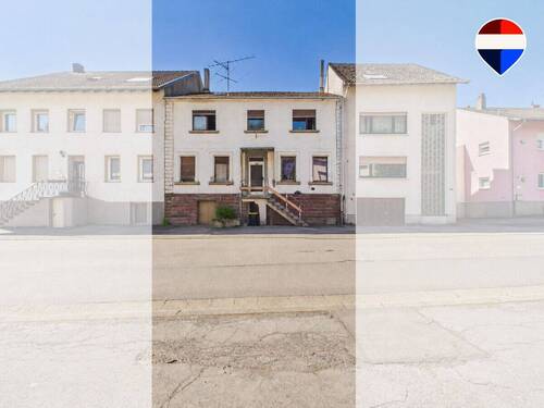 REMAX Immobilien DeLux Zweifamilienhaus Frontansicht Völklingen Mark Borowicz - Ideal für Handwerker - Zweifamilienhaus mit großem Sanierungspotenzial in Völklingen
