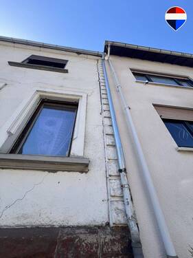 REMAX Immobilien DeLux Zweifamilienhaus Risse Völklingen Mark Borowicz - 