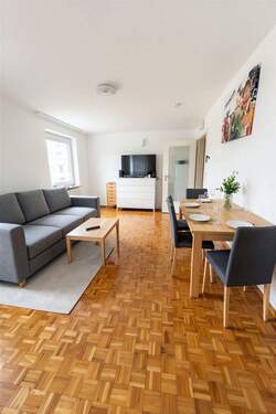 Wohnzimmern KI virtuell Möbliert - Kensington - Helle 2-Zimmer-Wohnung mit Südloggia, ruhiger Lage & eigener Garage