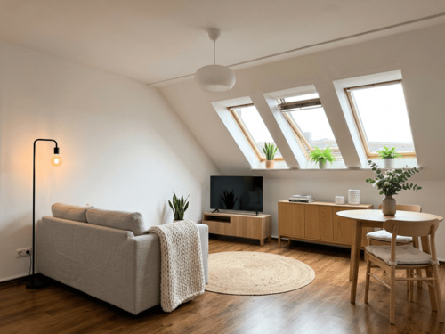 Wohnzimmer I - virtuell gestaltet.png - Freundliche 2-Zimmer-Wohnung mit Loggia und Tiefgaragenstellplatz im Herzen von Stockelsdorf.