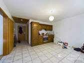 Wohnzimmer mit Küche - 1 Zimmer Etagenwohnung in Wörth an der Donau