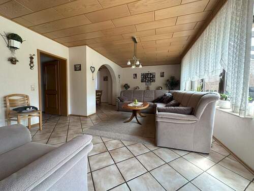 Wohnzimmer mit Essecke - 