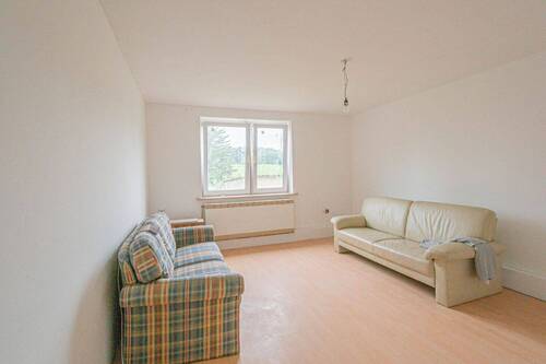 Hochparterre links - Wohnzimmer - 