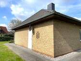 Hausseite mit extra Eingang zum Heizungsraum - Bungalow mit 101,40 m&sup2; in Marschacht zum Kaufen