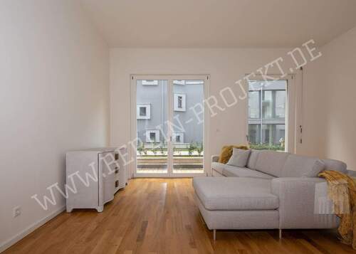 Wohnzimmer - Erdgeschosswohnung am Spittelmarkt - mit Terrasse und offener Küche