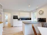 moderne Einbauküche mit Miele-Geräten - Etagenwohnung mit 52,00 m&sup2; in Ostseeheilbad Zingst zum Kaufen