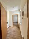 Heller Flur mit Holzboden - 1 Zimmer Etagenwohnung in Görlitz