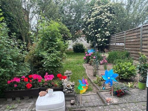Garten mit Terrasse - Reihenmittelhaus mit 82,00 m² in Jarmen zum Kaufen