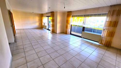 Wohnzimmer EG - Einfamilienhaus mit 198,00 m² in Lahnau zum Kaufen