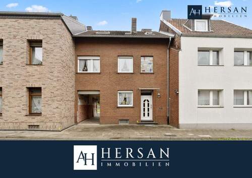 Titelbild - Einladendes Zweifamilienhaus in Alsdorf - Ruhige Lage mit Garten & Garage!