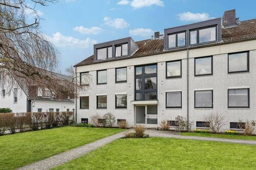 Bild 1 - 3,5 Zimmer Wohnung mit Süd-West Terrasse und Garage