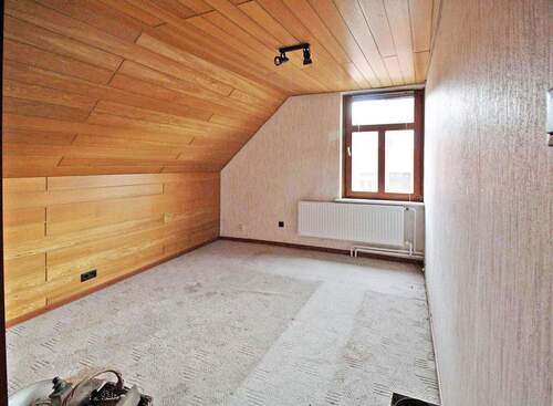 Zimmer im Dachgeschoss - 