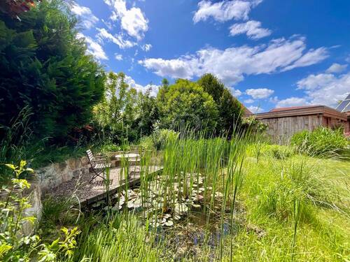 Idyllischer Platz am Gartenteich - Einfamilienhaus mit 209,00 m² in Springe / Gestorf zum Kaufen