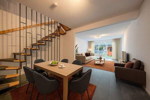 Wohnzimmer_Essdiele-2_gestaged - Reihenmittelhaus mit 110,40 m² in Elmshorn zum Kaufen