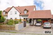 Ansicht Haus - Charmante 3-Zimmer-Wohnung mit Garten und Carport in Regenstauf-Diesenbach