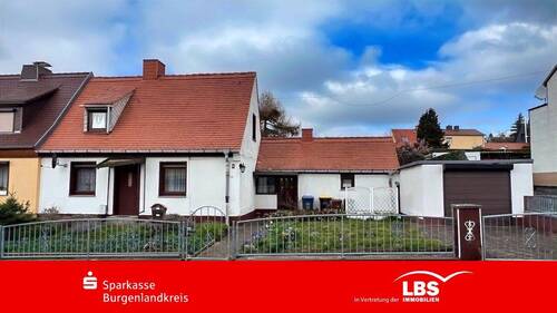 DHH mit Anbau und Garage - Anpacken, gut wohnen in Siedlungslage!