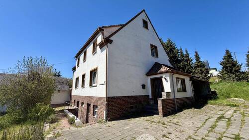 Giebelansicht Wohnhaus - Einfamilienhaus mit 100,00 m&sup2; in Penig zum Kaufen