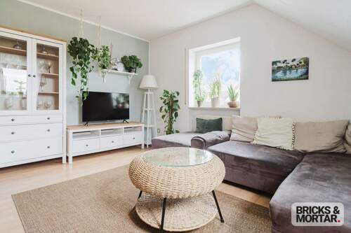 Wohnzimmer - Etagenwohnung mit 63,10 m&sup2; in Regenstauf zum Kaufen