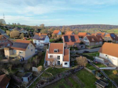 Gartenansicht - Licht, Raum und Aussicht - Architektenhaus mit Terrassenebene und besonderem Wohngefühl