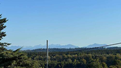 Bergblick von der Münchener Straße - ... AIGNER - Quartier am Wintererhof - exzellente Neubauwohnung im 1.OG in gehobener Ausführung ...