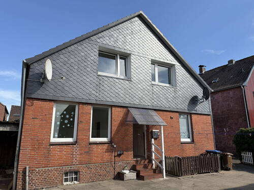 Rückseite - 7 Zimmer Mehrfamilienhaus, Wohnhaus zum Kaufen in Wilster