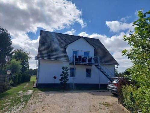 Hausansicht Einfahrt - 8 Zimmer Mehrfamilienhaus, Wohnhaus zum Kaufen in Börgerende