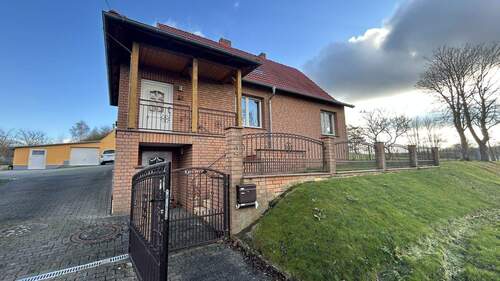 Außenansicht - 4 Zimmer Einfamilienhaus zum Kaufen in Groß Roge
