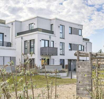 Gartenansicht - Luxuriöse Endetage mit Südterrasse