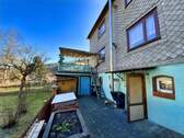 Anbau mit Terrasse - 7 Zimmer Mehrfamilienhaus, Wohnhaus in Schwarzatal