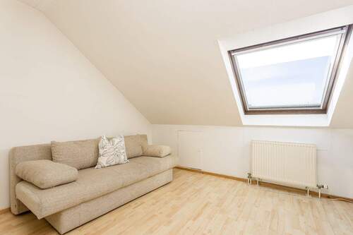 Zimmer im Dachgeschoss - 