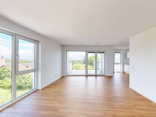 Ansicht I: Wohn- und Esszimmer mit offenem Küchenbereich - Platz & Komfort, gepaart mit modernem Design: Exklusive 3-Zimmer-Wohnung mit 2 BALKONEN, EBK und 2 Bädern