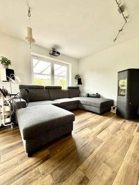 Wohnzimmer - Einfamilienhaus mit 141,00 m² in Neu-Anspach zum Kaufen