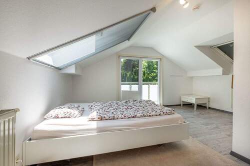 Schlafzimmer im OG mit Balkon - 