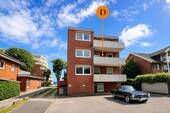 Rückansicht vom Haus (Westbalkon) - 3 Zimmer Etagenwohnung in Wyk auf Föhr