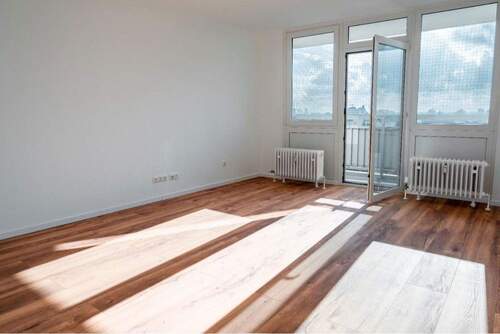 Wohnzimmer - Etagenwohnung mit 62,70 m² in Hanau zum Kaufen