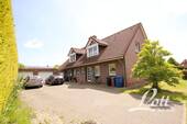 Bild 2 - 8 Zimmer Mehrfamilienhaus, Wohnhaus zum Kaufen in Westerstede / Ocholt