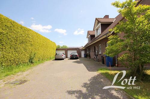 Bild 3 - 8 Zimmer Mehrfamilienhaus, Wohnhaus in Westerstede / Ocholt