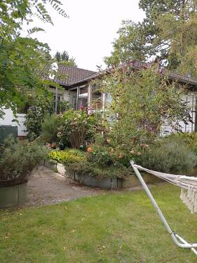 Blick auf den Wintergarten - Gemütliches Einfamilienhaus mit Naturgarten in Lichtenrade