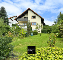 Viel Platz, viele Möglichkeiten: Zweifamilienhaus mit Traumgarten & zusätzlicher Einliegerwohnung - Wüstenrot Neuhütten