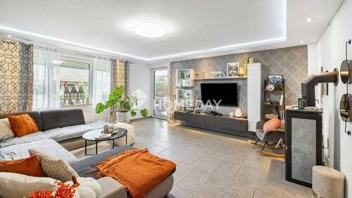 EG Wohnzimmer 1 - Familienparadies mit zwei Wohneinheiten - saniertes Zweifamilienhaus mit Garten, Terrasse & Sauna