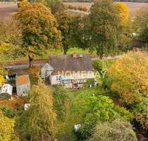 Charmantes EFH mit großem Grundstück, Nebengebäuden und idyllischer Lage in Warnow OT Schlockow
