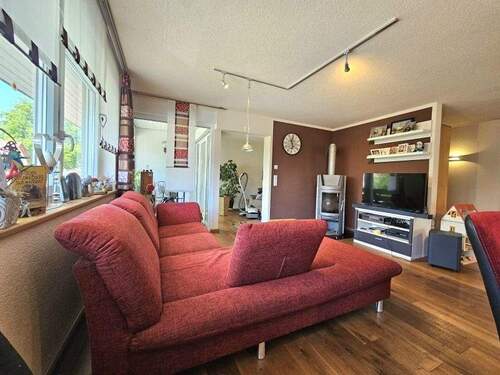 Wohnecke mit Kaminofen 1. OG - 