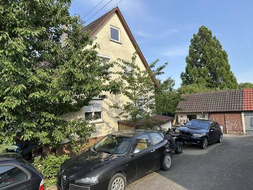 Hausansicht und Schuppen - Einfamilienhaus mit 96,00 m&sup2; in Ofterdingen zum Kaufen